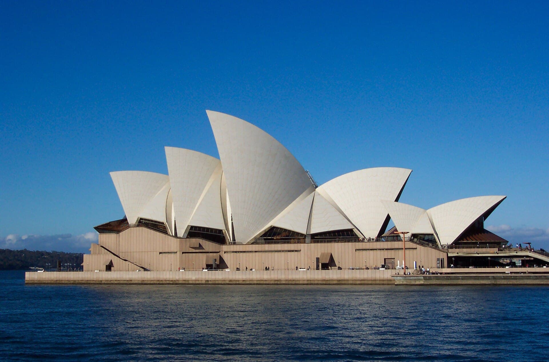 The sails of the Sydney Opera House against a clear sky